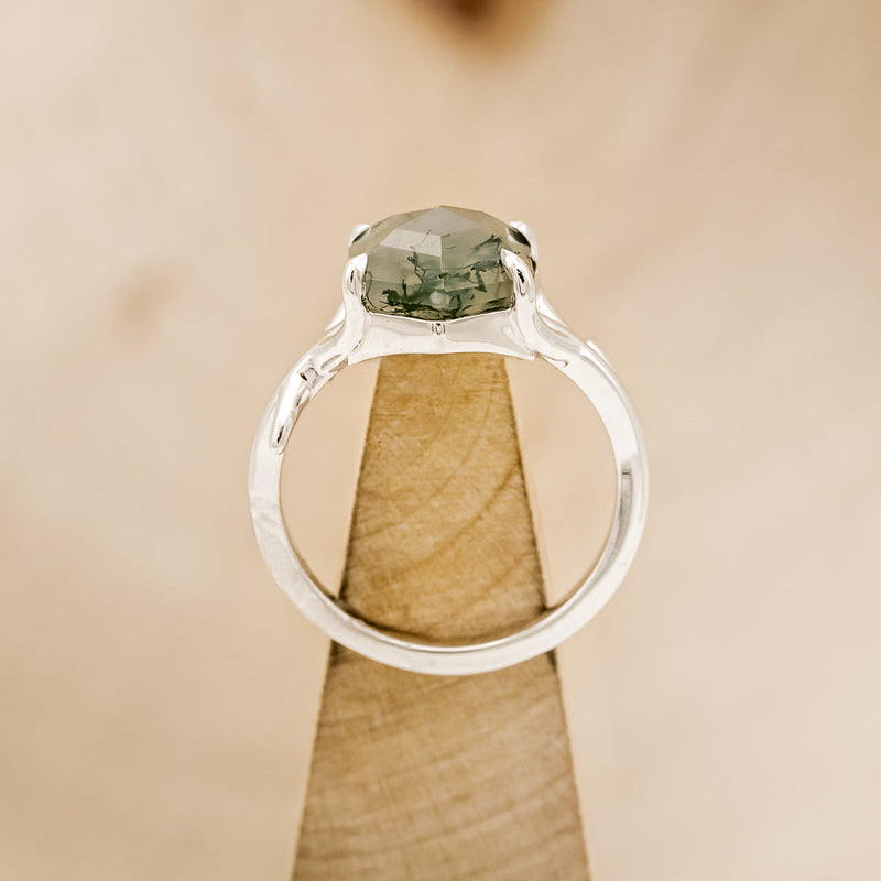 Shown here is "Artemis", an antler/branch-style moss agate women's engagement ring, side view on stand. Many other center stone options are available upon request.