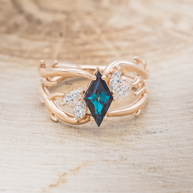 Shown here is "Artemis", an antler/branch-style lab-created alexandrite women's engagement ring with marquise diamond accents, front facing. Many other center stone options are available upon request.