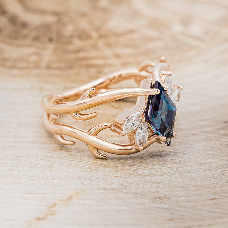 Shown here is "Artemis", an antler/branch-style lab-created alexandrite women's engagement ring with marquise diamond accents, facing right. Many other center stone options are available upon request.