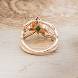 Shown here is "Artemis", an antler/branch-style lab-created alexandrite women's engagement ring with marquise diamond accents, back view. Many other center stone options are available upon request.
