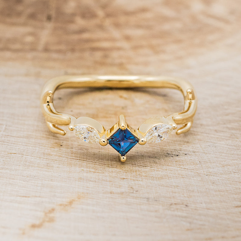 Shown here is "Artemis", an antler/branch-style lab-created alexandrite women's engagement ring with marquise diamond accents, front facing. Many other center stone options are available upon request.