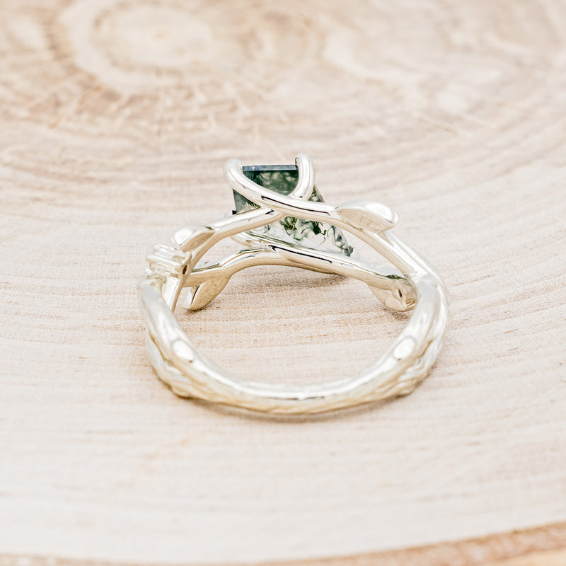 Shown here is "Artemis on the Vine", a branch-style moss agate women's engagement ring with diamond and leaf accents, back view. Many other center stone options are available upon request.
