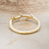Shown here is "Artemis", a stacking ring with pavé diamonds and an antler/branch style band, back view. Additional stone options are available upon request.