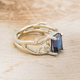 Shown here is "Artemis", an antler/branch-style lab-created alexandrite women's engagement ring with diamond accents, facing right. Many other center stone options are available upon request.