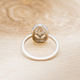 "LEVINA" - ROUND CUT DIAMOND ENGAGEMENT RING WITH DIAMOND HALO