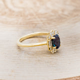 Shown here is "Cleopatra", an art deco-style oval lab-created alexandrite women's engagement ring with diamond accents, facing right. Many other center stone options are available upon request.