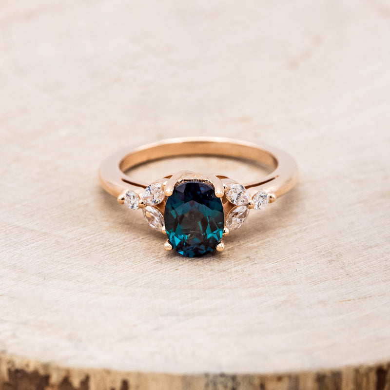 "BLOSSOM" - OVAL LAB-GROWN ALEXANDRITE ENGAGEMENT RING WITH LEAF-SHAPED DIAMOND ACCENTS
