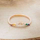 Shown here is "Reign", a marquise diamond tracer with rainbow accent stones, front facing. This tracer is made to go with some of our engagement rings (email for options)