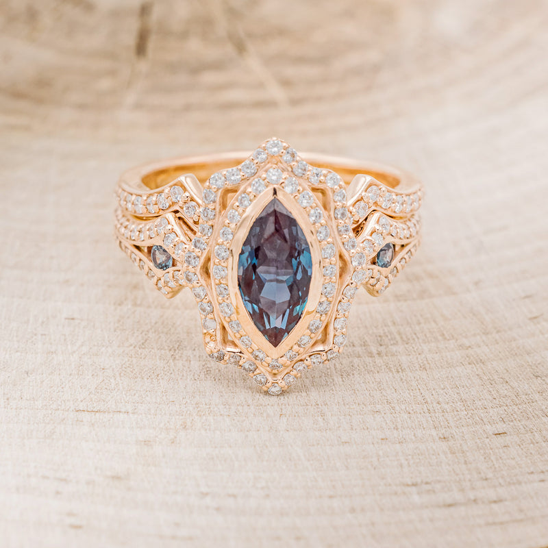 Shown here is "Adele", a marquise lab-created alexandrite women's engagement ring with alexandrite accents, diamond halo and diamond tracer, front facing. Many other center and side stone options are available upon request.