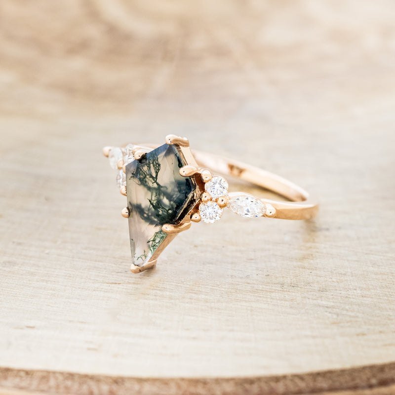 Shown here is "Sage", a moss agate women's engagement ring with diamond accents, facing left. Many other center stone options are available upon request.
