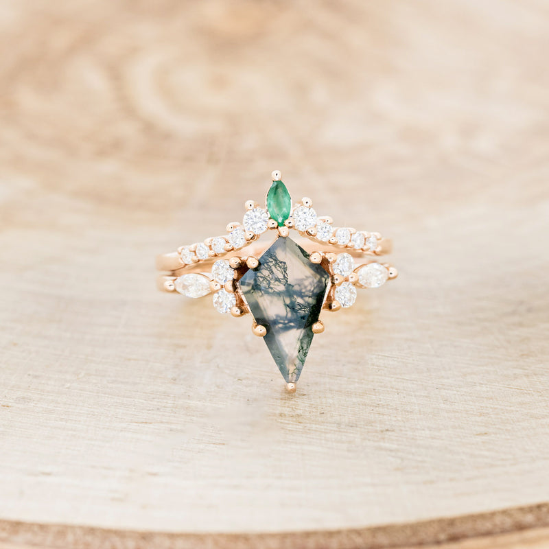Shown here is "Sage", a moss agate women's engagement ring with diamond accents and an emerald tracer, front facing. Many other center stone options are available upon request.