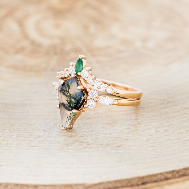 Shown here is "Sage", a moss agate women's engagement ring with diamond accents and an emerald tracer, facing left. Many other center stone options are available upon request.