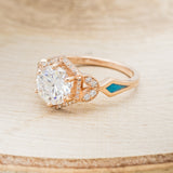 "LUCY IN THE SKY" - ROUND CUT MOISSANITE ENGAGEMENT RING WITH DIAMOND HALO & TURQUOISE INLAYS
