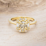 Shown here is "Cleopatra", an art deco-style champagne diamond women's engagement ring with diamond accents, front facing. Many other center stone options are available upon request.