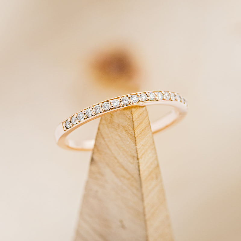 Shown here is The "Stella", a staking band-style diamond women's ring with delicate and ornate details.