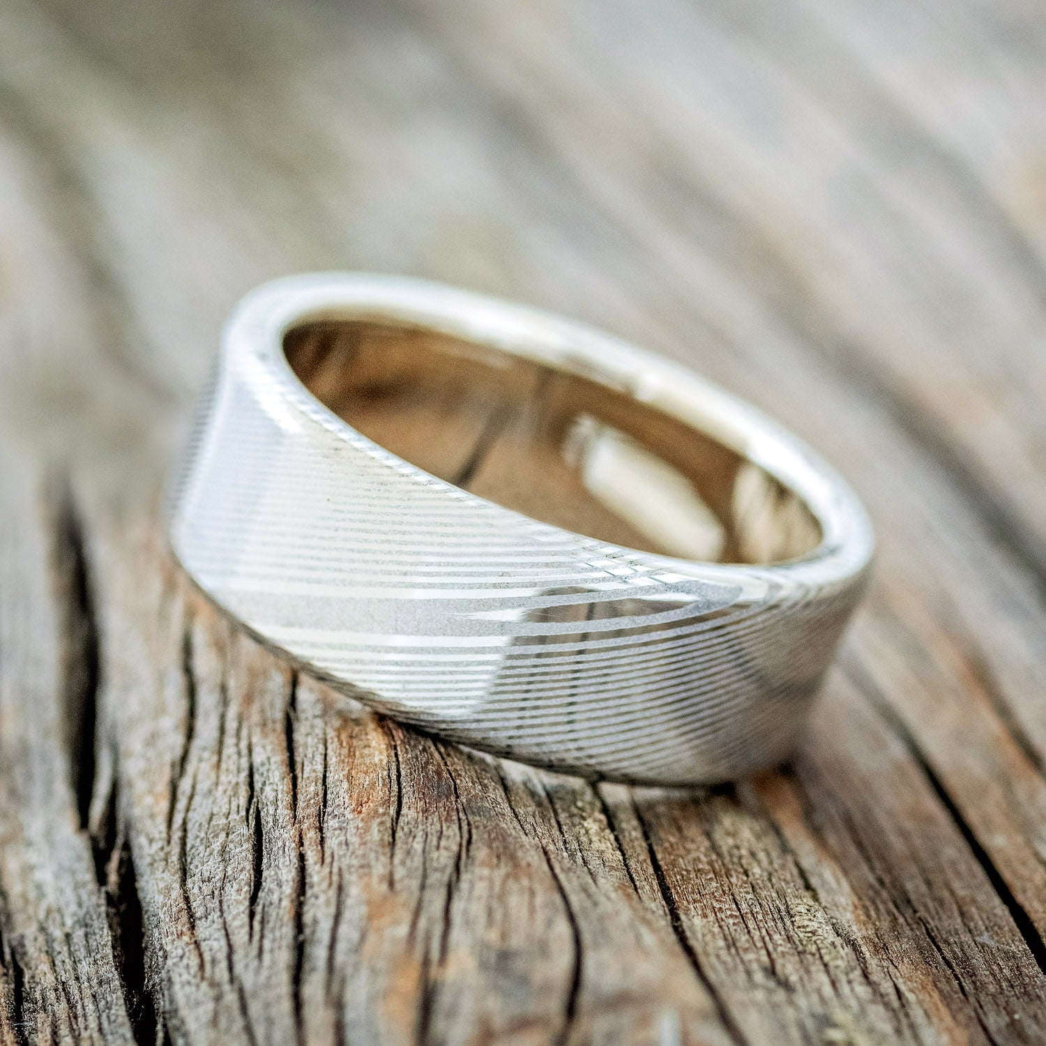 "VULCAN" - DAMASCUS STEEL WEDDING BAND WITH 14K GOLD LINING-10