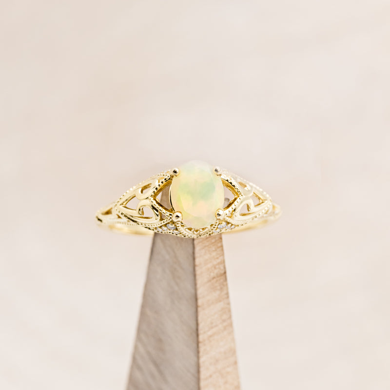 "RELICA" - OVAL WELO OPAL ENGAGEMENT RING WITH DIAMOND ACCENTS