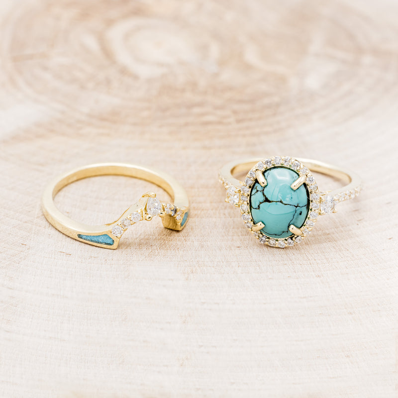 Shown here is "KB", a halo-style oval turquoise women's engagement ring with diamond accents and "Sama" tracer, laying together. Many other center stone options are available upon request.