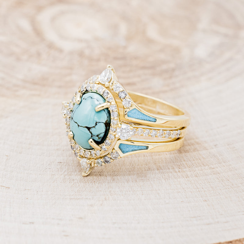 Shown here is "KB", a halo-style oval turquoise women's engagement ring with diamond accents and "Sama" tracers, facing left. Many other center stone options are available upon request.