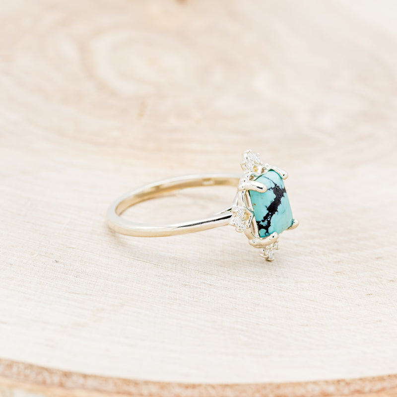 Shown here is "Treva", a turquoise women's engagement ring with diamond accents, facing right. Many other center stone options are available upon request.