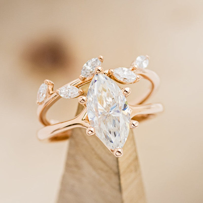 Shown here is A solitaire-style moissanite women's engagement ring with delicate and ornate details and is available with many center stone options -2ct MARQUISE SOLITAIRE ENGAGEMENT RING WITH DIAMOND PETAL SHAPED BAND (available in 14K rose, white & yellow gold) - Staghead Designs - Antler Rings By Staghead Designs