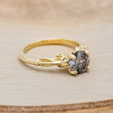 Shown here is "Rosemary", a vintage-style women's engagement ring with sculptural-inspired band displayed here with a round salt and pepper diamond but listed here as a mounting-only option, facing right. Follow the instructions above to select your stone.