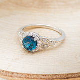 ROUND CUT LAB-GROWN ALEXANDRITE ENGAGEMENT RING WITH DIAMOND HALO & ACCENTS
