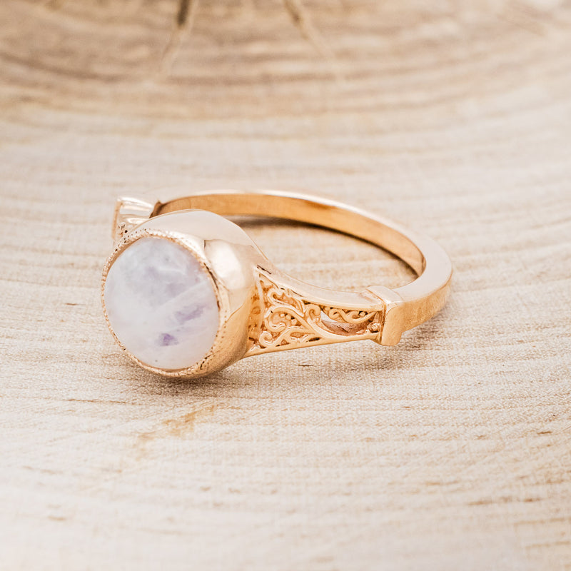 Shown here is "Selene", an accented-style moonstone women's engagement ring, facing left. Many other center stone options are available upon request.