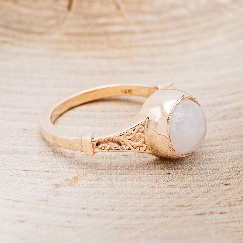 Shown here is "Selene", an accented-style moonstone women's engagement ring, facing right. Many other center stone options are available upon request.