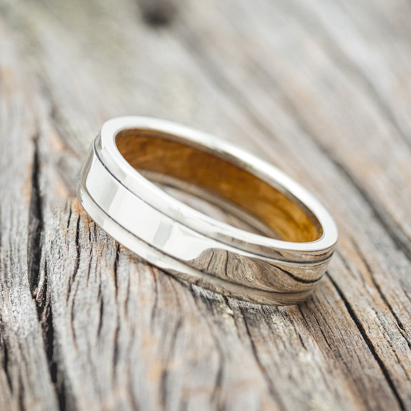 "SEDONA" - RAISED CENTER WEDDING RING FEATURING A WHISKEY BARREL LINED 14K GOLD BAND