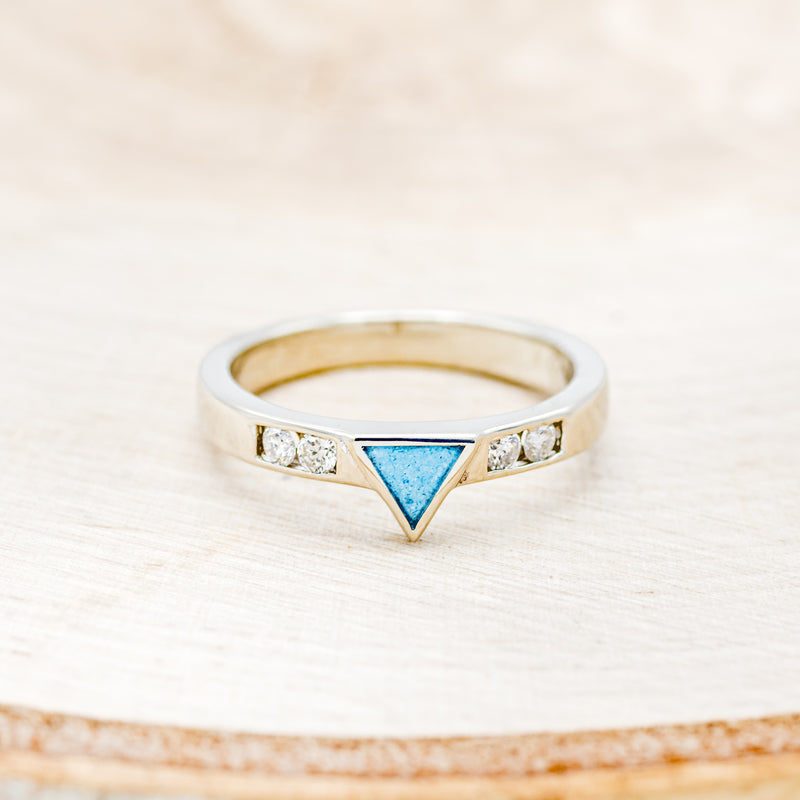 Shown here is a custom, handcrafted women's stacking band featuring a triangle channel with hand-crushed turquoise and 2 diamonds on each side of the triangle, front facing. Additional inlay options are available upon request.