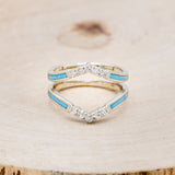Shown here is "Raya", ring guard, a custom, handcrafted ring featuring turquoise inlays and diamond accents, front facing.