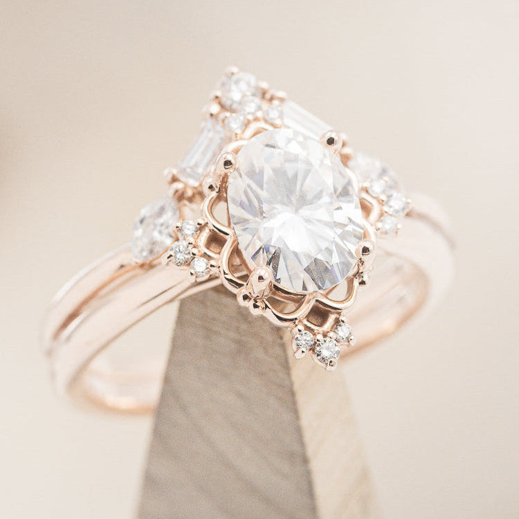 "TREVA" - OVAL MOISSANITE ENGAGEMENT RING WITH DIAMOND ACCENTS & "MELODY" TRACER-18