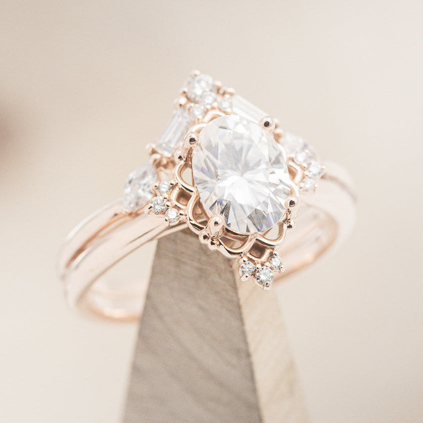 "TREVA" - OVAL MOISSANITE ENGAGEMENT RING WITH DIAMOND ACCENTS & "MELODY" TRACER-18