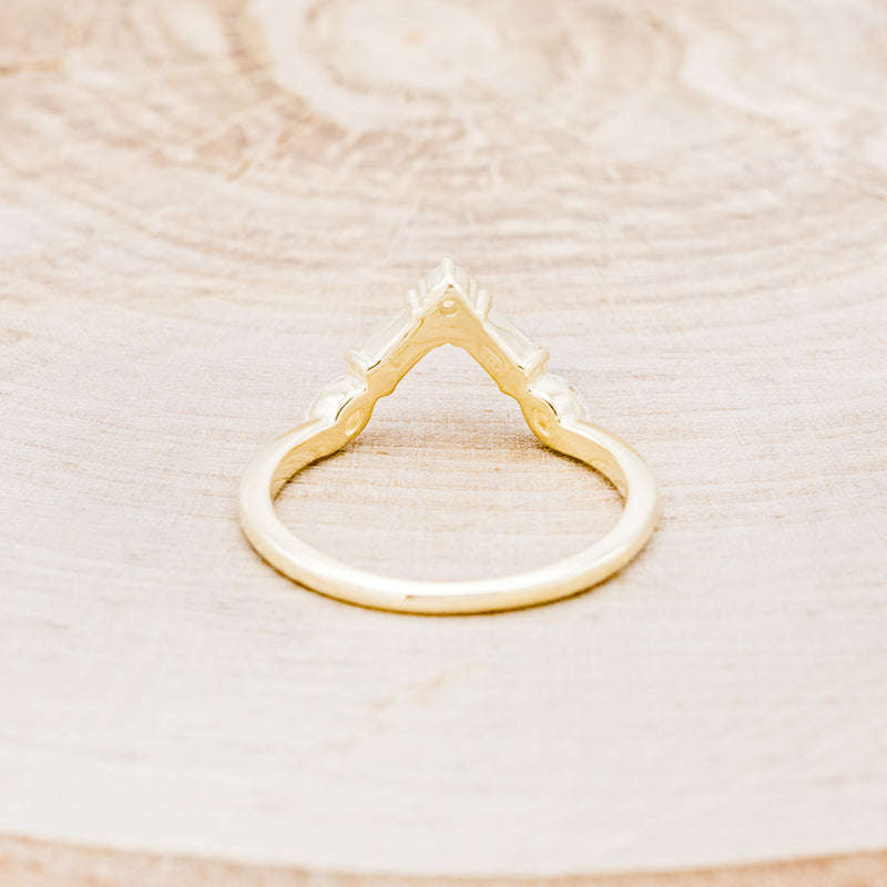Shown here is "Melody", a 14K gold v-shaped tracer with 1/4 CTW diamonds, back view.