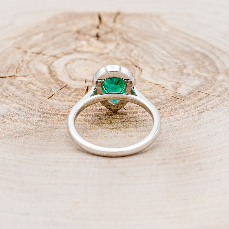 "ARABELLA" - PEAR-SHAPED LAB-GROWN EMERALD ENGAGEMENT RING WITH DIAMOND ACCENTS & PEARL TRACER