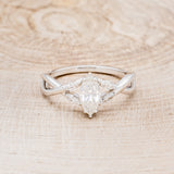 "ELECTA" - MARQUISE MOISSANITE ENGAGEMENT RING WITH DIAMOND ACCENTS