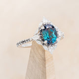 "NORTH STAR" - OVAL LAB-GROWN ALEXANDRITE ENGAGEMENT RING WITH DIAMOND HALO & BLACK DIAMOND ACCENTS