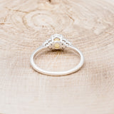 "RHEA" - OVAL WHITE OPAL ENGAGEMENT RING WITH DIAMOND ACCENTS