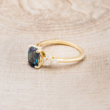 "BLOSSOM" - OVAL LAB-GROWN ALEXANDRITE ENGAGEMENT RING WITH LEAF-SHAPED DIAMOND ACCENTS