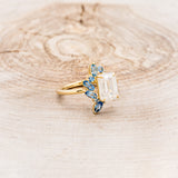 "ISABELLA" - EMERALD CUT MOISSANITE ENGAGEMENT RING WITH AQUAMARINE ACCENTS
