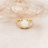 ROUND CUT WHITE OPAL ENGAGEMENT RING WITH DIAMOND HALO