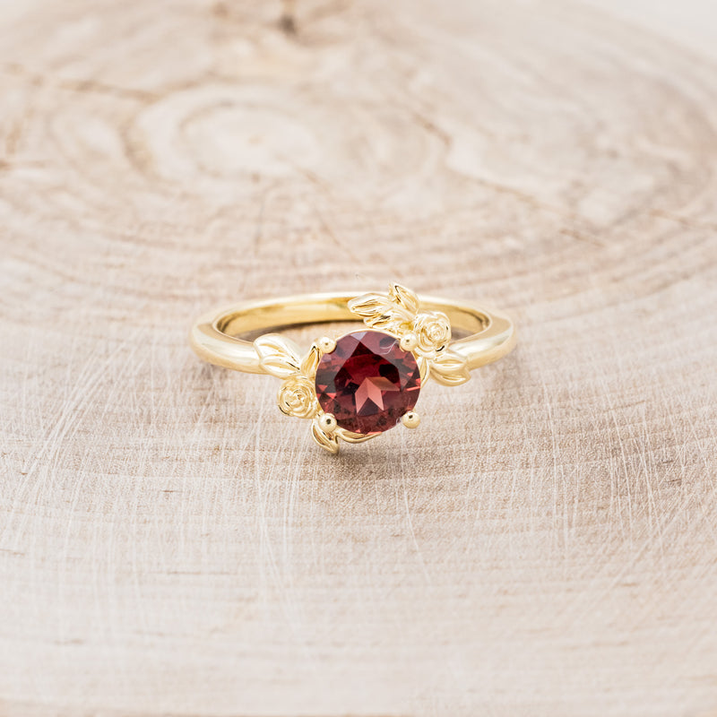 "ROSA" - ROUND CUT MOZAMBIQUE GARNET ENGAGEMENT RING WITH FLOWER ACCENTS