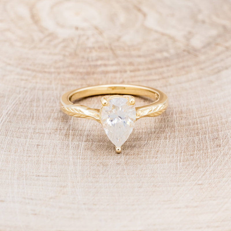 "HOPE" - PEAR-SHAPED MOISSANITE SOLITAIRE ENGAGEMENT RING WITH FEATHER ACCENTS-4