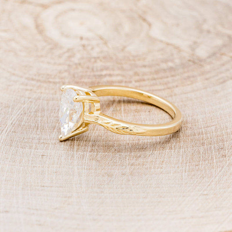 "HOPE" - PEAR-SHAPED MOISSANITE SOLITAIRE ENGAGEMENT RING WITH FEATHER ACCENTS-3