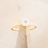 "HOPE" - ROUND CUT MOONSTONE SOLITAIRE ENGAGEMENT RING WITH FEATHER ACCENTS