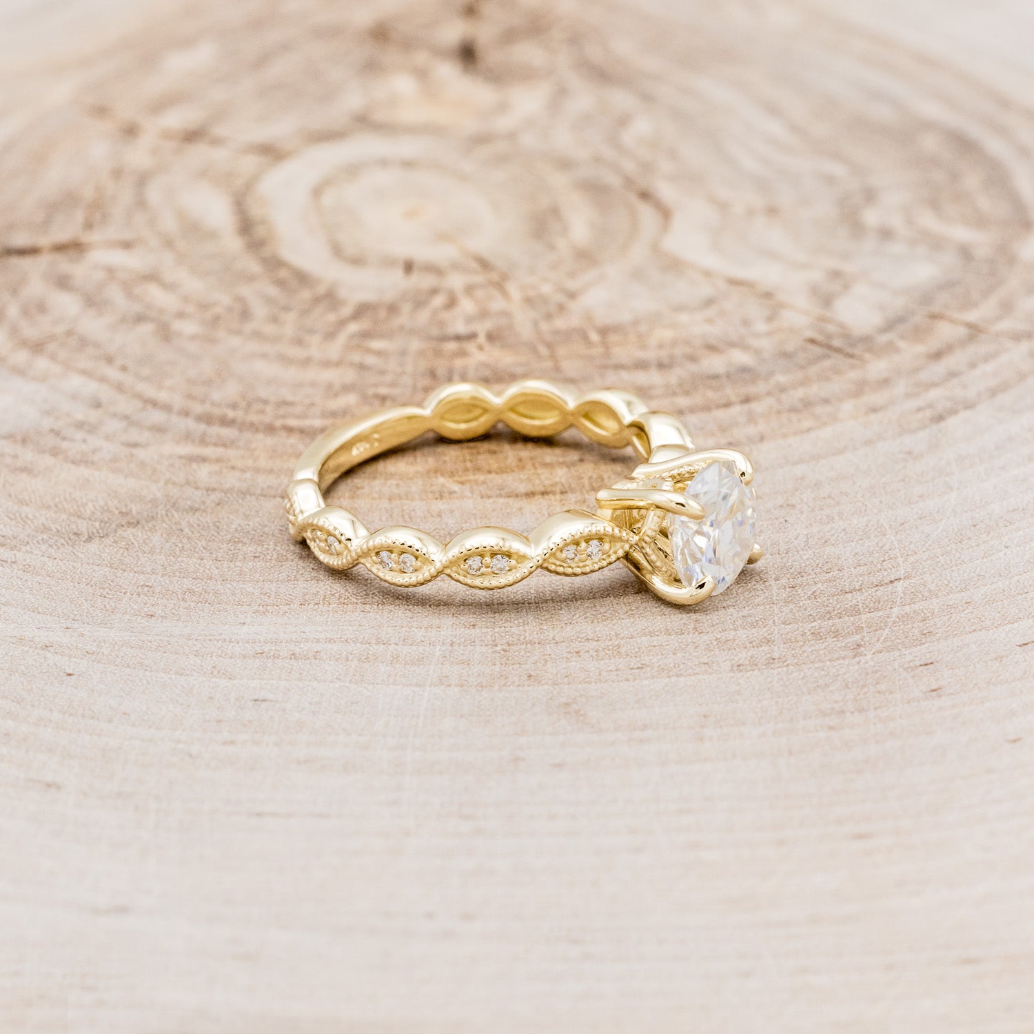 "NOUR" - ROUND CUT MOISSANITE ENGAGEMENT RING WITH DIAMOND ACCENTS-2