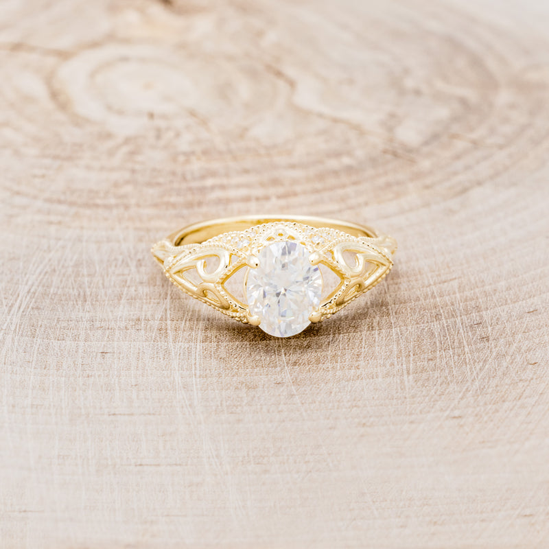 "RELICA" - OVAL MOISSANITE ENGAGEMENT RING WITH DIAMOND ACCENTS & DIAMOND TRACER