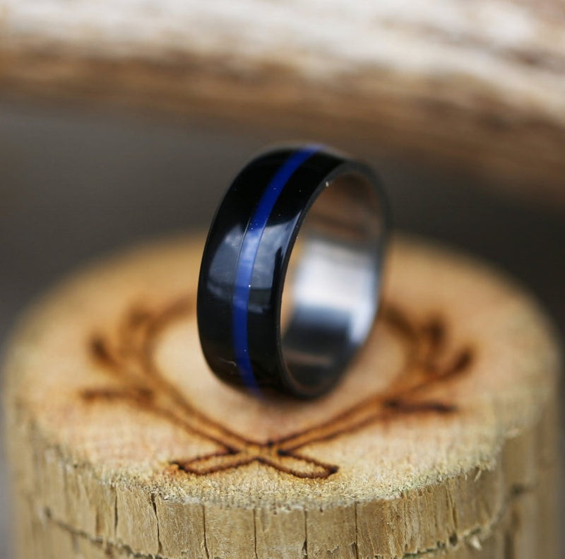 Shown here is A custom, handcrafted men's wedding ring featuring a hand-turned blue and black acrylic, which could symbolize the "Thin Blue Line". Additional inlay options are available upon request.-BLACK AND BLUE ACRYLIC RING [THIN BLUE LINE] (available in titanium, silver, black zirconium & 14K white, rose or yellow gold) - Staghead Designs - Antler Rings By Staghead Designs