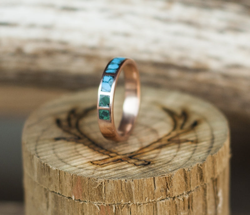 Shown here is  a custom, handcrafted women's stacking band featuring a  hand crushed turquoise & malachite inlays, shown here on a 14k rose gold band. Additional inlay options are available upon request.